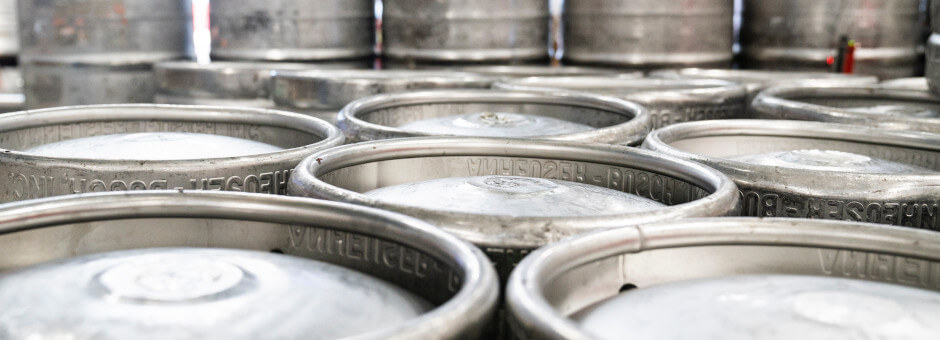 Container filled with freshly brewed beer