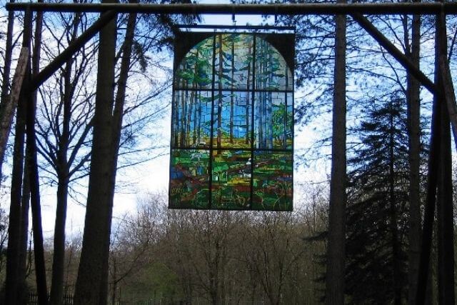 The Cathedral, stained glass window suspended in the iar along the Sculpture Trail.