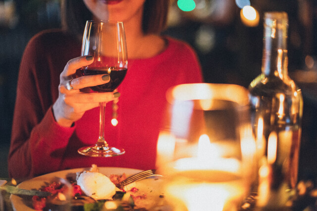 Woman with red wine at Bourton-on-the-Water pub