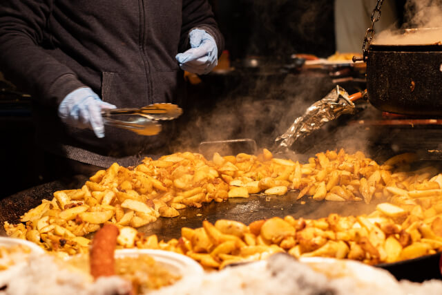 Fried potatoes at Christmas market in Gloucestershire 