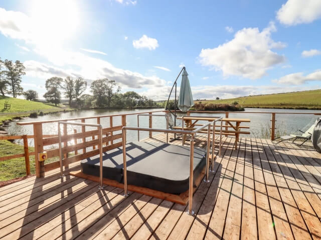 Douglas Cabin decking and lake view