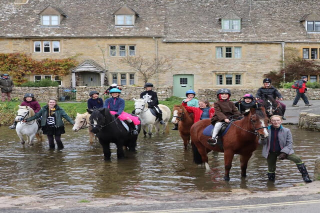 Young children on horse riding holiday for beginners uk