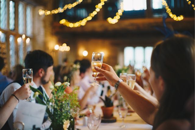 toasting the bride and groom